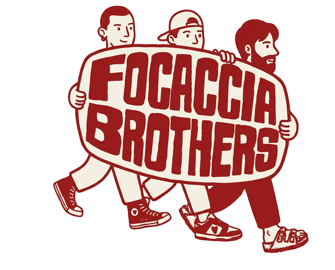 The three Focaccia Brothers holding the Focaccia Brothers sign